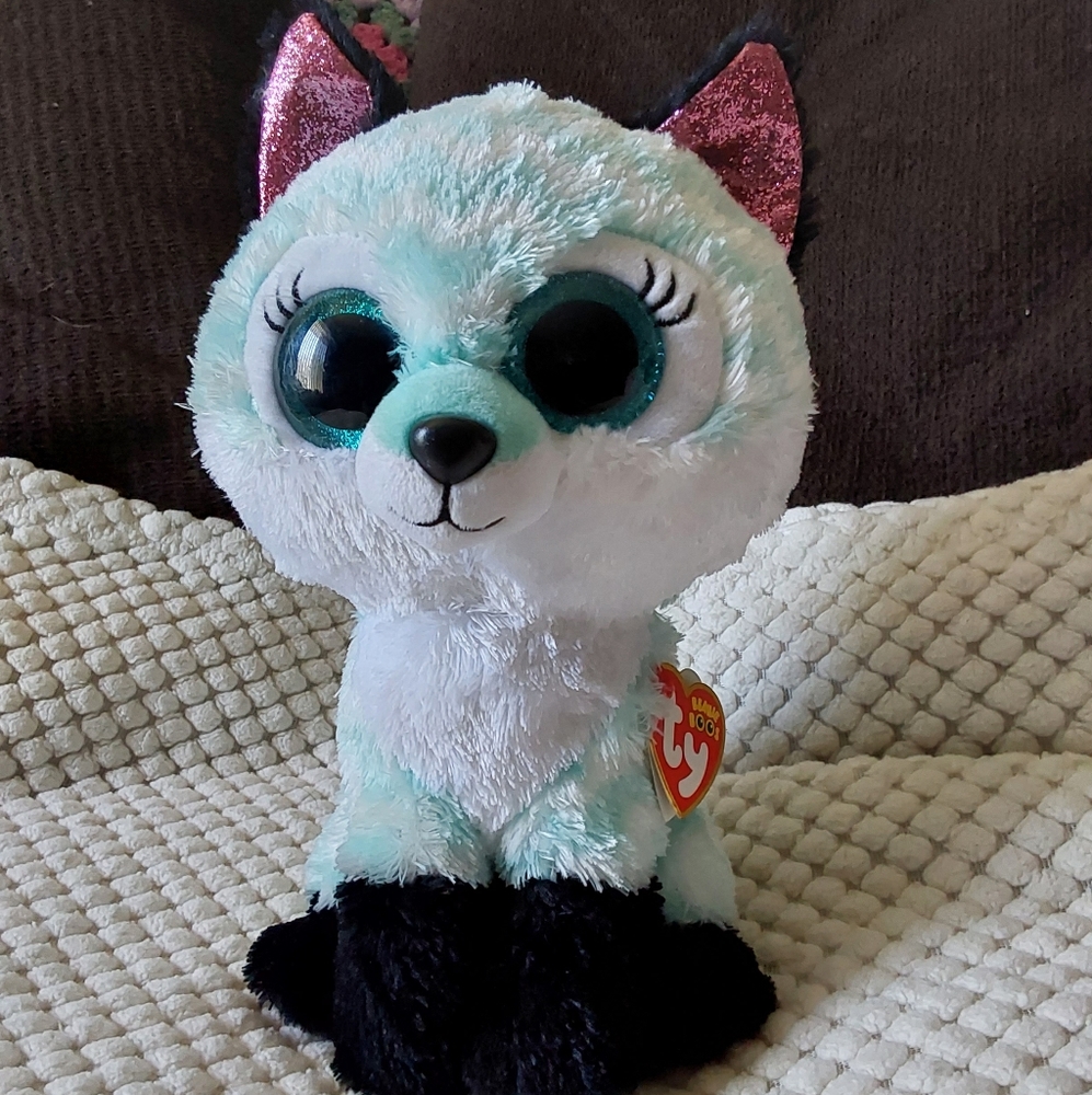 A medium blue and white fox